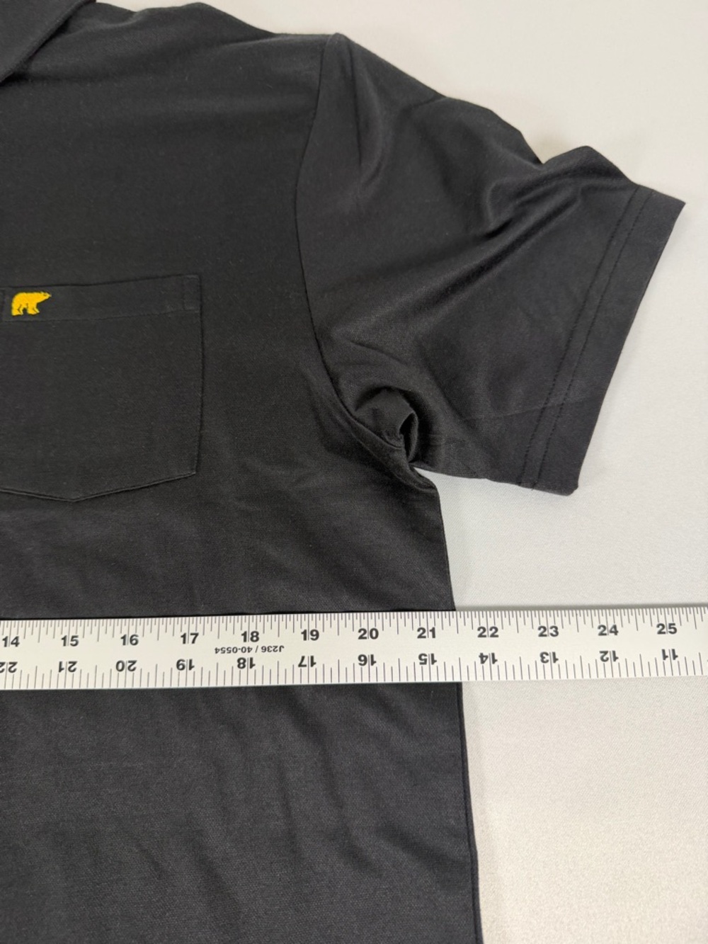 Men's Black Polo Shirt with Chest Pocket and Subtle Yellow Logo - Picture 4 of 6